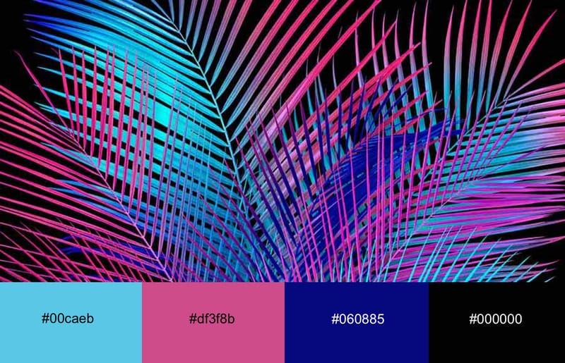 Tropical leaves colored in neon pink and cyan