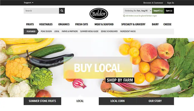 Ecommerce website homepage for Baldor featuring fresh produce categories and “Buy Local” call-to-action.