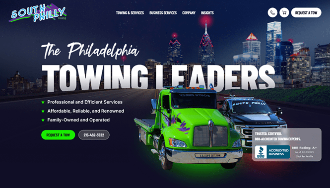Towing company website with bold typography, city skyline background, and featured service vehicles