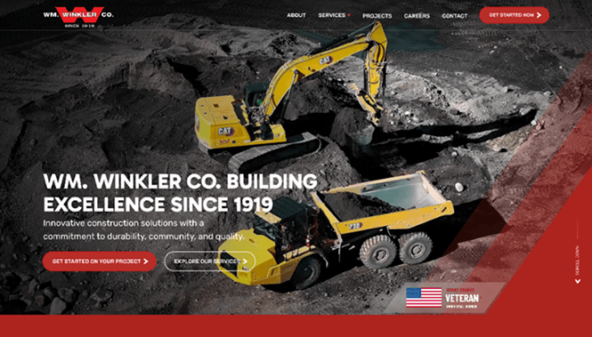 Construction company website featuring heavy machinery and excavation site with bold branding